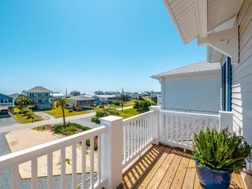 a balcony with a view of the beach at Channel 6 in Surf City