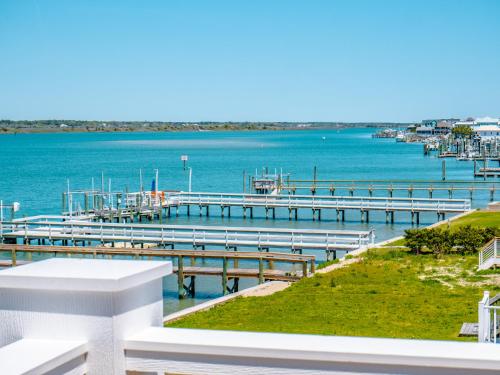 a view of a dock with a marina at Channel 6 in Surf City