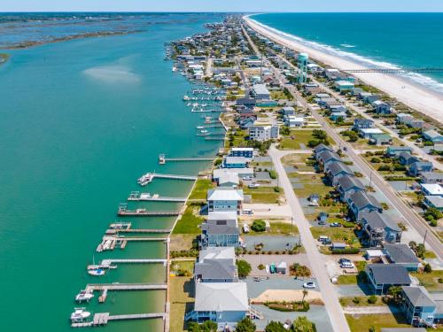 an aerial view of a marina with houses and boats at Channel 6 in Surf City