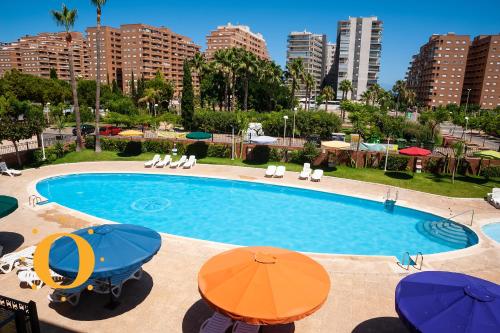 Bazén v ubytovaní Holiday Deluxe Magic World Playa Coral I alebo v jeho blízkosti