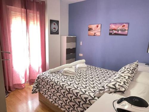 Postel nebo postele na pokoji v ubytování Apartamento El Faro