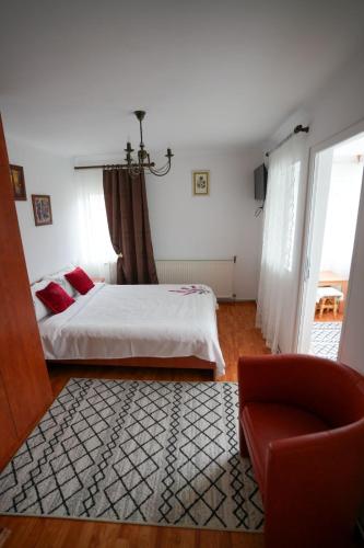 Ένα ή περισσότερα κρεβάτια σε δωμάτιο στο Vila Passiflora