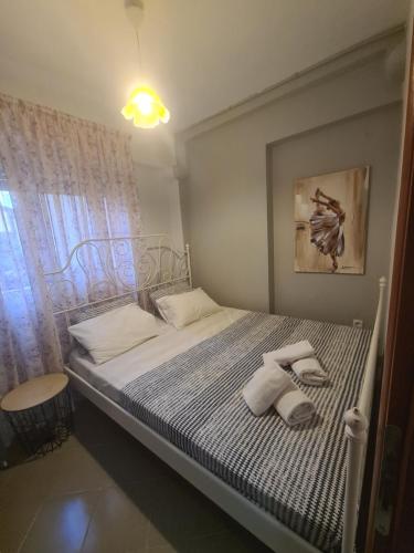 Postel nebo postele na pokoji v ubytování Makis Apartments Touzla