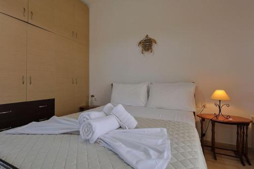 Katil atau katil-katil dalam bilik di Zeusplace Leptokarya Seaside Apartment
