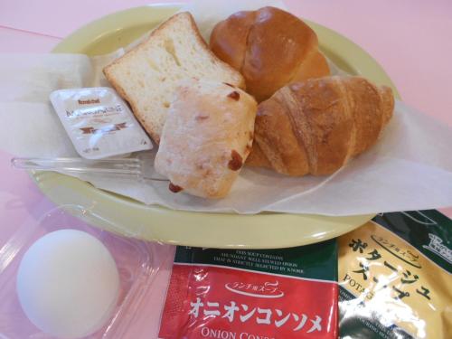 a plate of food with bread and pastries on it at Nishikawaguchi Station Hotel - Vacation STAY 98562v in Kawaguchi