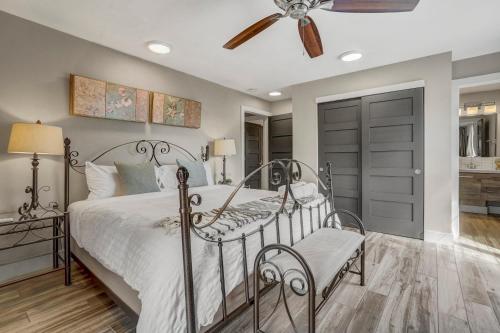 a bedroom with a bed and a ceiling fan at Red Rock Loft! Trails Apartment w BBQ & Fire Pit in Colorado Springs