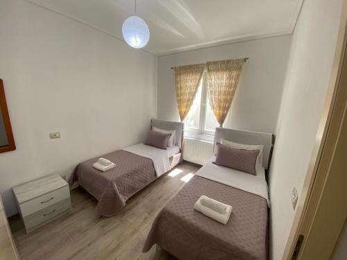 Postel nebo postele na pokoji v ubytování PatZOO Apartments
