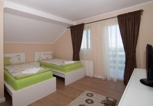 Postel nebo postele na pokoji v ubytování Casa Felix