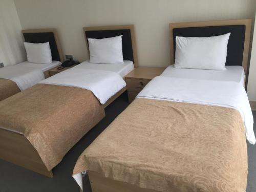 Letto o letti in una camera di Soffia Hotel Baku