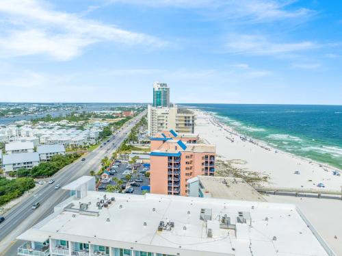 an aerial view of the beach and the ocean at Four Seasons 103E by Vacation Homes Collection in Orange Beach