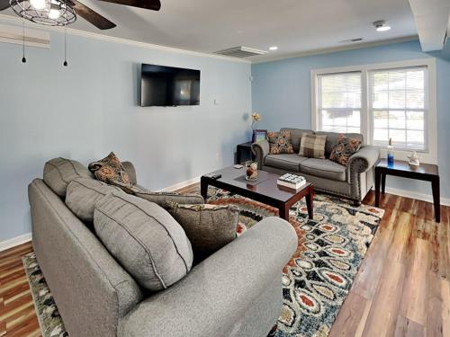 Posezení v ubytování East Coast Kuuipos Cottage