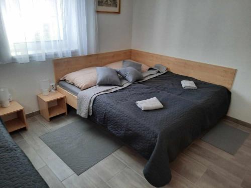 Postel nebo postele na pokoji v ubytování Apartmán u Bouře