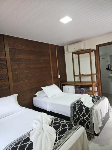 Letto o letti in una camera di Pousada Villa Encantada Ilha do Mel