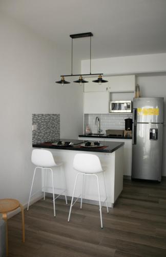 Кухня или мини-кухня в Apartamento Narama Aeropuerto z13 Guatemala
