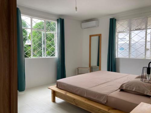 Postel nebo postele na pokoji v ubytování Duplex Résidence Cardano-jardin privé