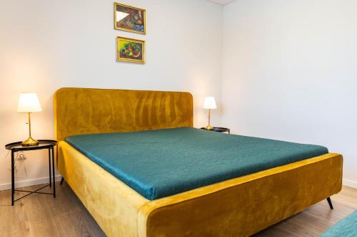 Posteľ alebo postele v izbe v ubytovaní Stylish Apartment With Free Parking