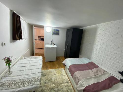 Postel nebo postele na pokoji v ubytování Casa Ardeleana