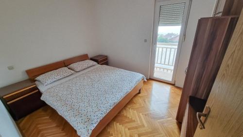 Postel nebo postele na pokoji v ubytování Silvestar