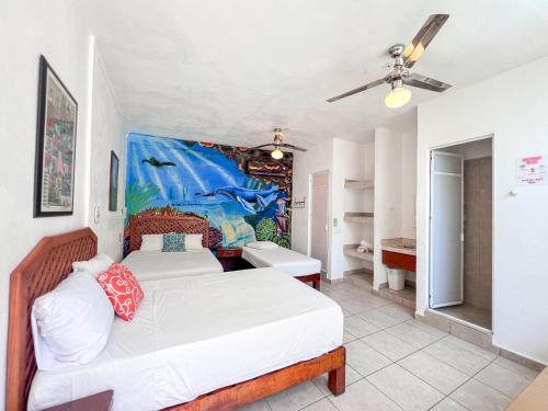Postel nebo postele na pokoji v ubytování ITH Sayulita Amazing Surf Hostel