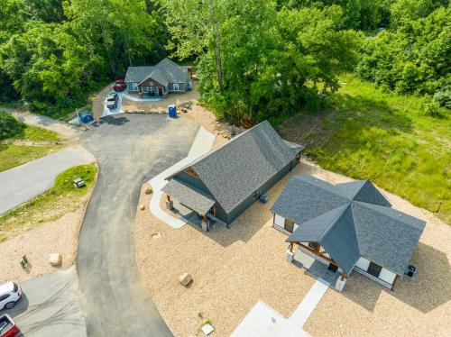 an overhead view of a house with a roof at New Ozark Oasis Luxe Cabin Retreat with Hot Tub in Hollister