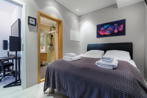 Postel nebo postele na pokoji v ubytování Apartment in Downtown Reykjavík