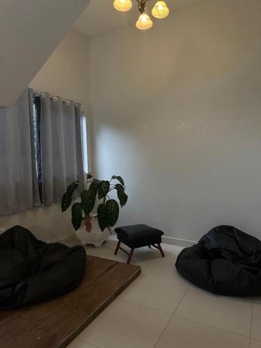 Ruang duduk di Tenório Beach Hostel 400 MTS da praia do Tenório