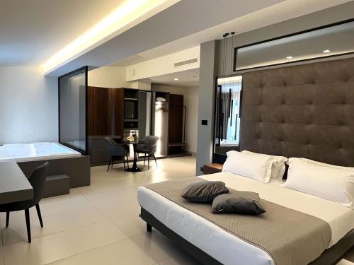 A bed or beds in a room at Best Western Hotel Ferrari