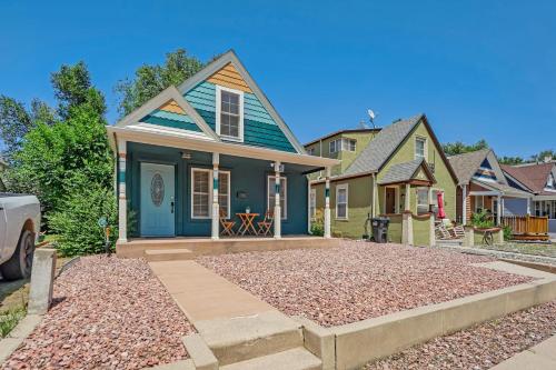 a house with a blue door and a driveway at Neighborly Heights - Downtown King BBQ Fire Pit in Colorado Springs