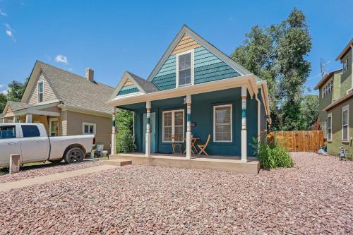 a blue house with a truck parked in front of it at Neighborly Heights - Downtown King BBQ Fire Pit in Colorado Springs