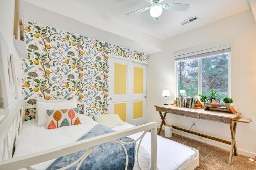 a bedroom with a bed and a window and a desk at Beautiful Pet-Friendly Washougal Home with Fire Pit! in Washougal