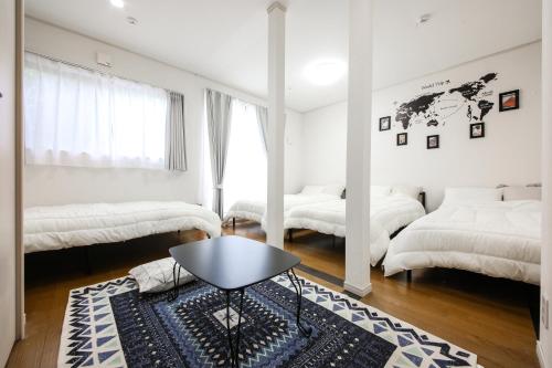 Postel nebo postele na pokoji v ubytování 3, Kameido, Entire house for rent