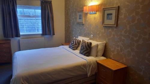 Cama o camas de una habitación en Hotel 1843 Reading