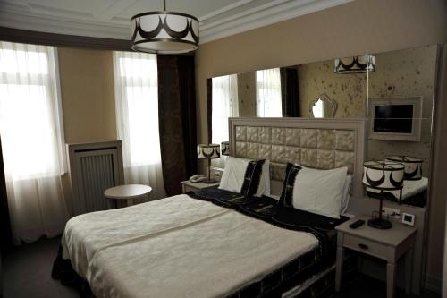 Кровать или кровати в номере Fuat Pasa Oteli - Special Category Bosphorus