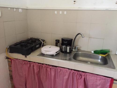 Kuchyň nebo kuchyňský kout v ubytování Casa a pasos del corazón de Zapatoca