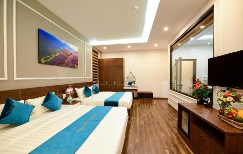 Ein Bett oder Betten in einem Zimmer der Unterkunft Airport Classic Hotel & Travel