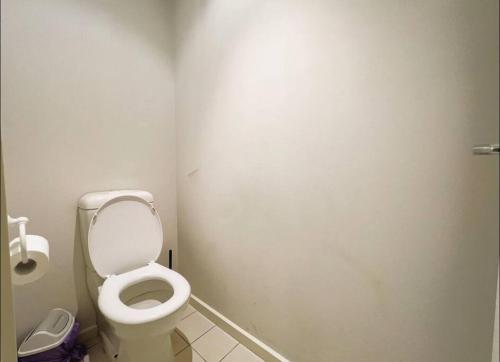 a bathroom with a white toilet in a stall at GW24-1 BATH 2 BR at The Glen with FREE Parking and Balcony in Glen Waverley