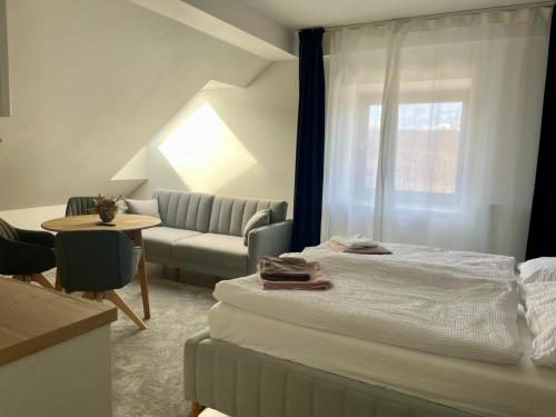 Postel nebo postele na pokoji v ubytování Apartmány Javorná
