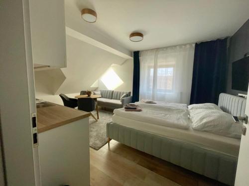Postel nebo postele na pokoji v ubytování Apartmány Javorná