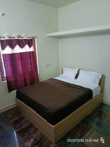 Postel nebo postele na pokoji v ubytování BNS Village Resort