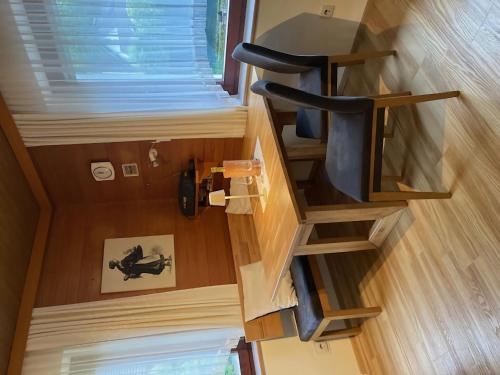 Ruang duduk di Modern apartment with garden near the Petzen ski area in Eberndorf Carinthia