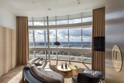 Posezení v ubytování Vilnius TV Tower Apartments DEBESYS
