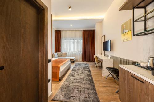 Una cama o camas en una habitación de Nuca Homes