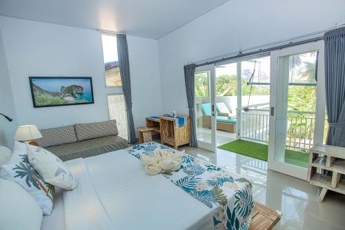 Postel nebo postele na pokoji v ubytování Island Style Retreat