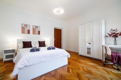 Postel nebo postele na pokoji v ubytování Apartmány u Vlašského dvora