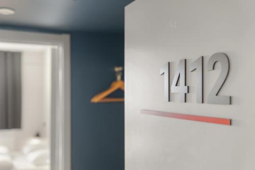 a close up of a door with a clock on it at Danhostel Copenhagen City & Apartments in Copenhagen