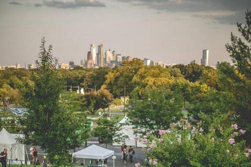a view of a park with a city in the background at New Season Royals, Airport West in Chester