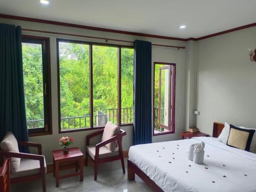 Katil atau katil-katil dalam bilik di Vang Vieng Champa Resort