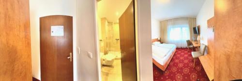 Koupelna v ubytování Hotel Dreieich