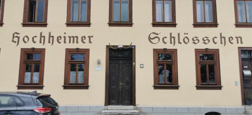 a building with a door and some windows at Pension Hochheimer Schlösschen in Erfurt