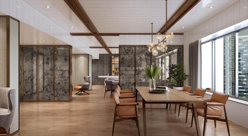 a dining room with a table and chairs at Amara Singapore in Singapore